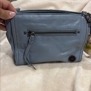 The Sak Blue Clutch with Wristlet and Structured Design